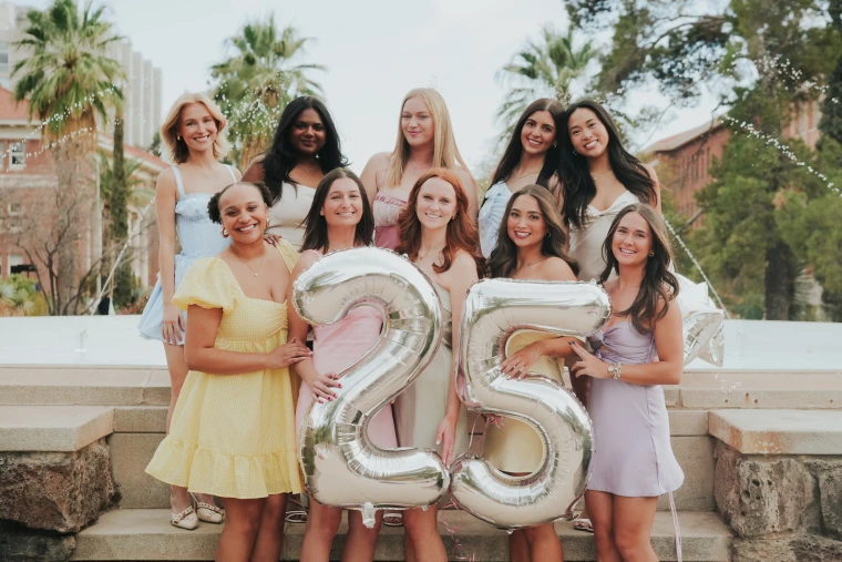 2025 Panhellenic Executive Board holding balloons that say 25