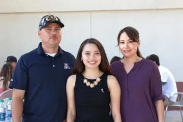 A girl and her parents